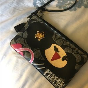 RARE find!!!⭐️⭐️POPPY WRISTLET, LIMITED EDITION